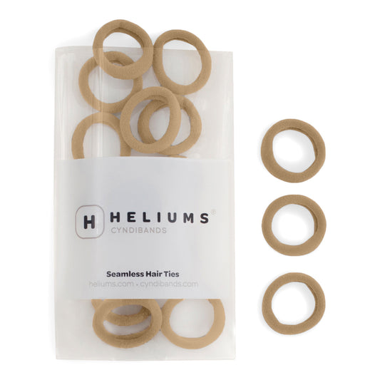 Heliums small seamless hair ties in medium blonde, shown in a pack and individually