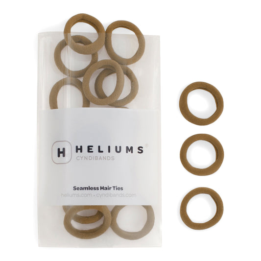 Heliums small seamless hair ties in dark golden blonde, shown in a pack and individually