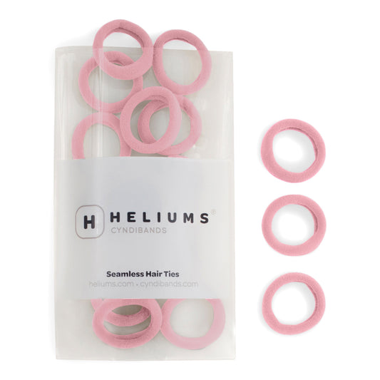 Heliums small seamless hair ties in light pink, shown in a pack and individually