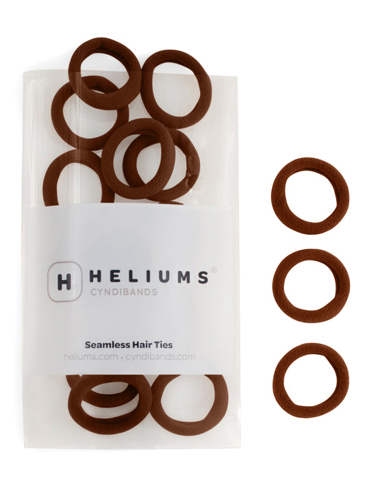 Heliums small seamless hair ties in brown, shown in a pack and individually