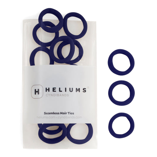 Heliums small seamless hair ties in navy blue, shown in a pack and individually